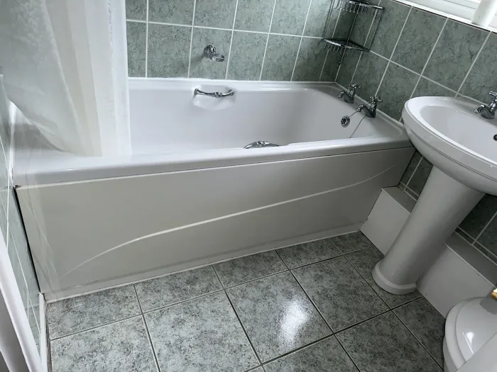 A customer's bath before the door was fitted