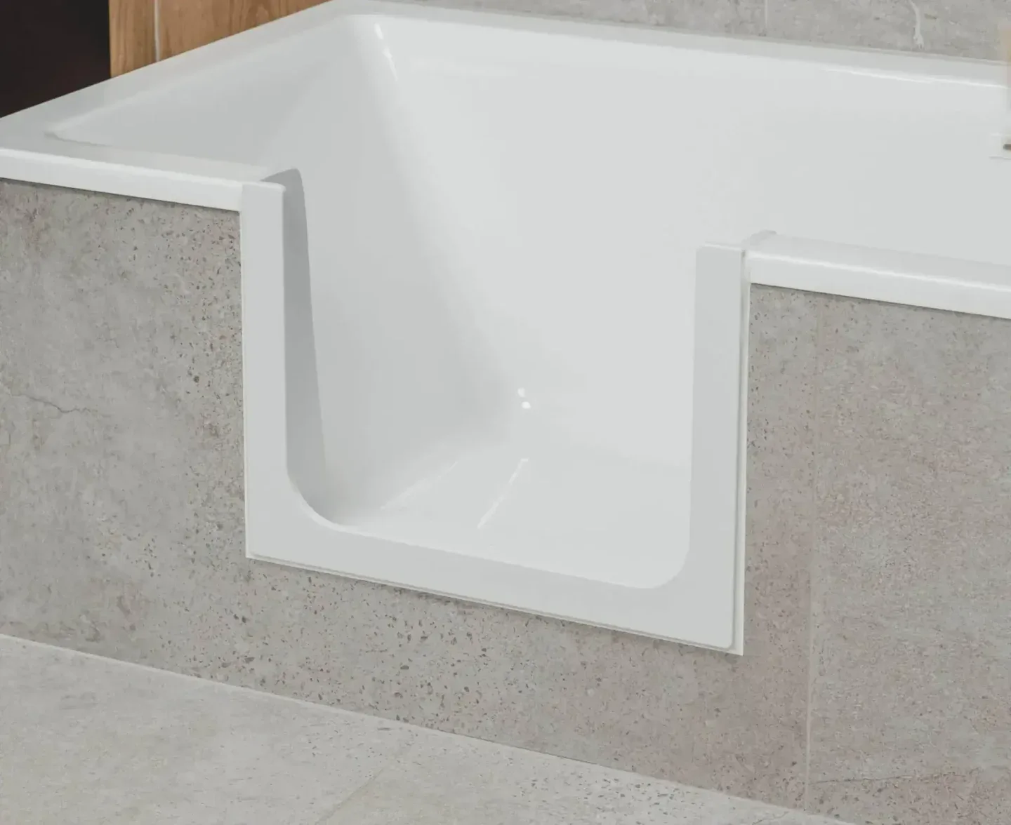 The U-shaped frame: an open low step-through cut into the side of the bath